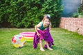 Children wrapped in a beach towel during summer vacation. Wet kids on summer swimming pool with towel. babies having happy time on Royalty Free Stock Photo