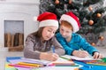 Children writing letter to santa, wait for christmas Royalty Free Stock Photo