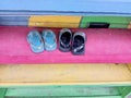 The children's flip-flops left on the shoe rack