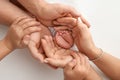 Children& x27;s foot in the hands of mother, father, parents. Feet of a tiny newborn Royalty Free Stock Photo