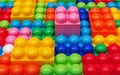 Children's multi-colored constructor as an abstract background. Multicolored blocks close-up. Royalty Free Stock Photo