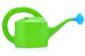 Children's plastic watering can for playing in the sandbox or in the garden. Green watering can isolated on a white Royalty Free Stock Photo