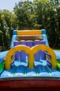 Children& x27;s playground outdoors attraction fragment inflatable on trampoline children Royalty Free Stock Photo