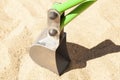 Children& X27;s Toy Excavator Car On Sand Beach Background Or Toy Backhoe Excavator On The Playground Sand