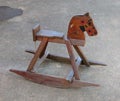 A childrens antique wooden rocking horse