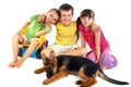 Children with young dog Royalty Free Stock Photo