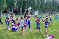 Children and young women Ã¢â¬â volunteers, participating at cheerleading training