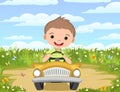 Childrens adventure in small car. Sandy glade on meadow. Kid drives pedal or electric toy automobile. Cartoon