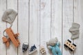 Childrens background, baby toys and shoes, wooden plane and car, layout on wooden background, happy mothers day