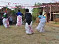 Childrens competiting in sack race. Celebration to welcome Independence day of Indonesia Royalty Free Stock Photo