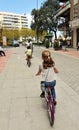 Family bike ride in the city