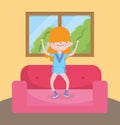 Childrens day, little girl jumping in the sofa