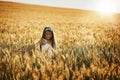 Childrens eyes see the world as it should be. a cute little girl twirling in a cornfield. Royalty Free Stock Photo