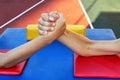 Childrens hands, arm wrestling