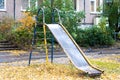 Childrens metal slide with peeling paint