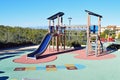 Childrens Playground - Slide Climbing Frame And Swings Royalty Free Stock Photo