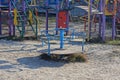 Childrens playground with a one round colored carousel