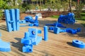 childrens playground in park with blue giant geometric figures for the development of imagination and spatial thinking Royalty Free Stock Photo