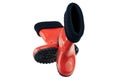 Childrens shoes and boots. Closeup of seasonable red rubber boots or gumboots isolated on a white background. Clipping path. Kids Royalty Free Stock Photo