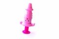 Childrens toy syringe pink isolated object on white background Royalty Free Stock Photo