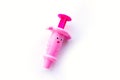 Childrens toy syringe pink isolated object on white background Royalty Free Stock Photo