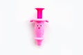 Childrens toy syringe pink isolated object on white background Royalty Free Stock Photo