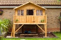 Childrens wooden treehouse in the garden Royalty Free Stock Photo