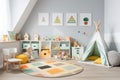 childs bedroom featuring a play area with toys