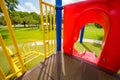 Child\'s choice between an easy slide or difficult stairs at the playground