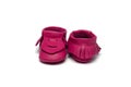 Childs dark pink booties on a white background