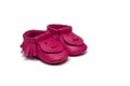 Childs dark pink booties on a white background