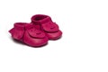 Childs dark pink booties on a white background