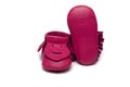 Childs dark pink booties on a white background