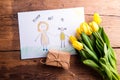 Childs drawing of her mother, yellow tulips, little gift