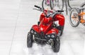 Childs electric red four wheel motorcycle Royalty Free Stock Photo