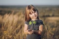 Childs hands holding a small maple tree Royalty Free Stock Photo