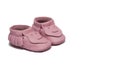 Childs light pink booties on a white background