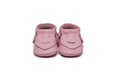 Childs light pink booties on a white background