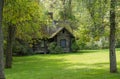 Childs playhouse in log cabin in the woods Royalty Free Stock Photo