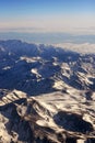 CHILE ARGENTINA Aerial view of the Andes mountain range with highest and snowy peaks such as Aconcagua. Royalty Free Stock Photo