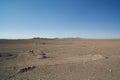 Chile, Atacama desert - view of desert with hills in the back and tracks of industrial activity Royalty Free Stock Photo