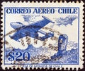 CHILE - CIRCA 1956: A stamp printed in Chile shows De Havilland Venom FB.4 and Easter Island monolith, circa 1956.