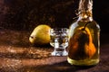 Chilean brandy with whole pear inside bottle. Aguardiente de pera. Royalty Free Stock Photo