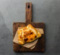 Chilean empanada de pino on wooden board Royalty Free Stock Photo