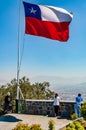 Chilean flag waving over Santiago de Chiles