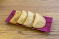 Chilean meat empanadas on red blotter