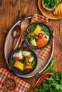 Chilean meat soup with pampkin, corn, fresh coriander and potatoes on old wooden table background. Cazuela. Latinamerican food Royalty Free Stock Photo