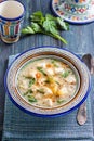 Chilean quinoa soup with cheese and milk.