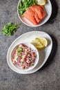 CHILEAN SALMON SEVICHE. Fresh raw salmon marinaded with purple onion, coriander in lemon juice. Ceviche and ingredientes