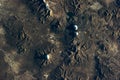 Chilean volcanos mountains relief Satellite view texture from earth above . Elements of this image furnished by NASA.